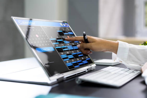 Scheduling And Booking Online Appointment In Calendar Using Laptop